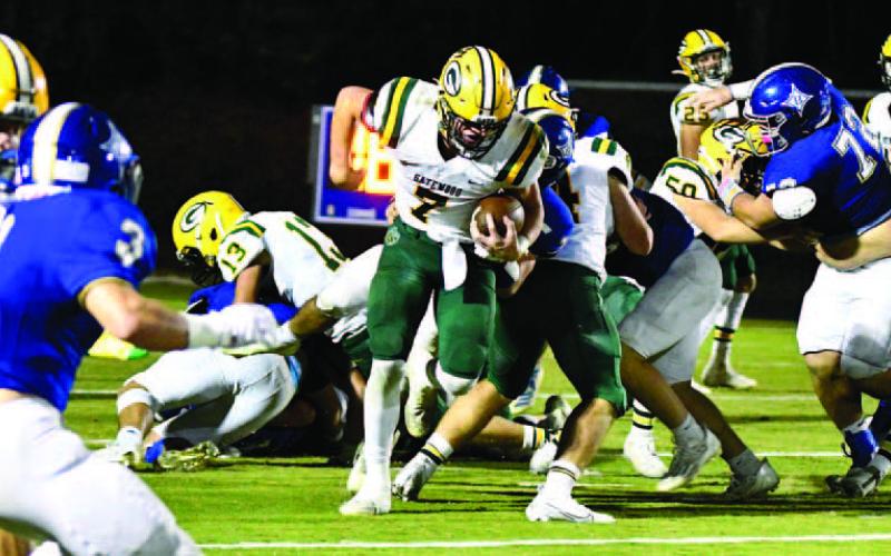 Evan Bennett (7) breaks free to gain a few yards on the ground for Gatewood last Friday night against the Brentwood War Eagles in Sandersville. DAWN SINCLAIR/Contributed