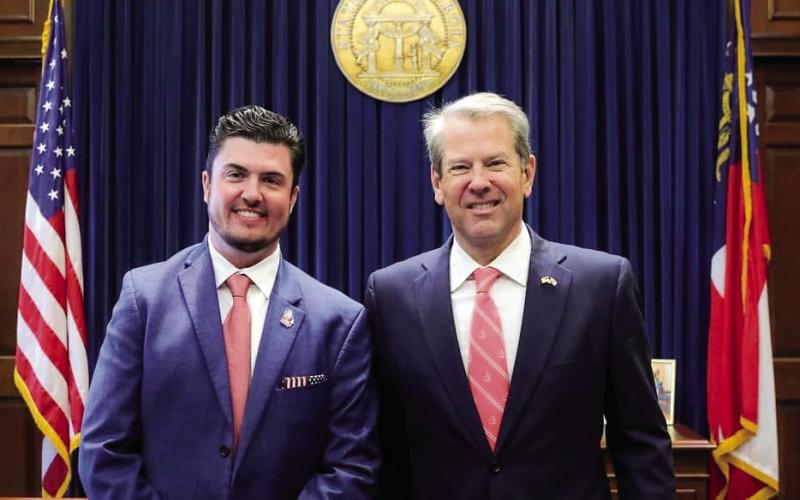 Governor Brian Kemp (right) recently reappointed Trevor J. Addison, Clerk of Superior, State, and Juvenile Courts for Putnam County, to the Georgia Superior Court Clerks’ Cooperative Authority. CONTRIBUTED