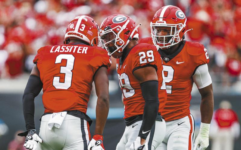 Georgia defensive back Kamari Lassiter (3) and Georgia defensive back Christopher Smith (29) during Georgia’s game against Florida at TIAA Bank Field in Jacksonville in 2022. TONY WALSH/UGA Athletics