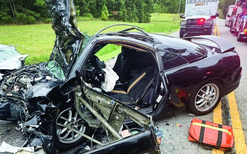Three Eatonton men remain hospitalized in serious and critical condition from injuries sustained in a head-on collision that involved this Mitsubishi Eclipse and Toyota Corolla Saturday. CONTRIBUTED/PCSO