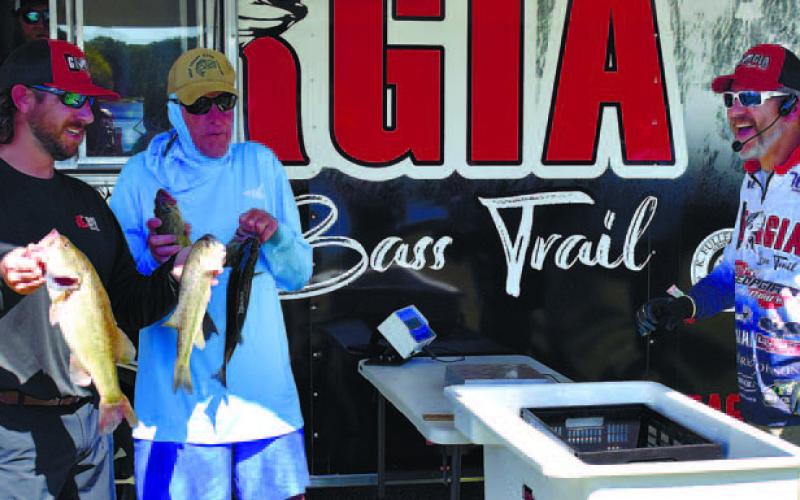 The weigh-in inevitably tells the tale for competitors in the WJVA charity bass tournament. T. MICHAEL STONE/Staff