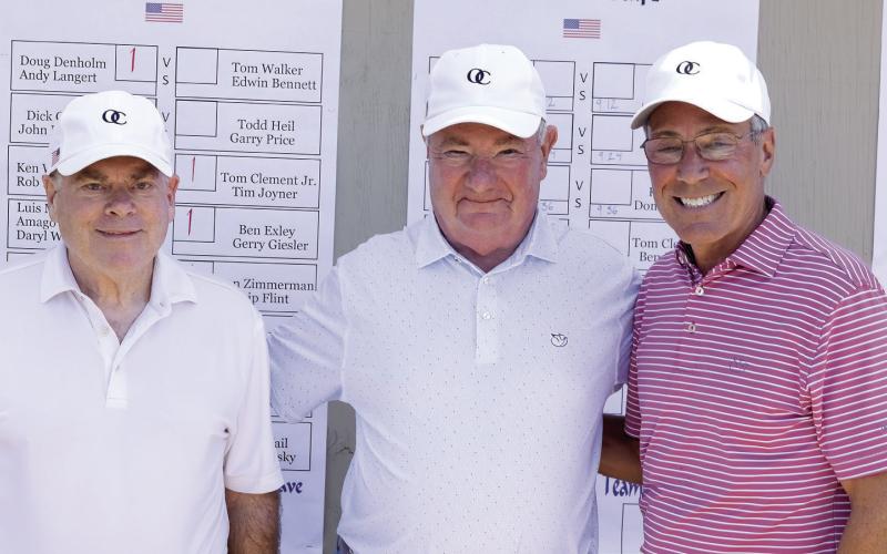 Senior Team Captain Steve Cross, Commissioner Pat McNabb and Team Captain Bill McCleave. LEIGH LOFGREN/Staff