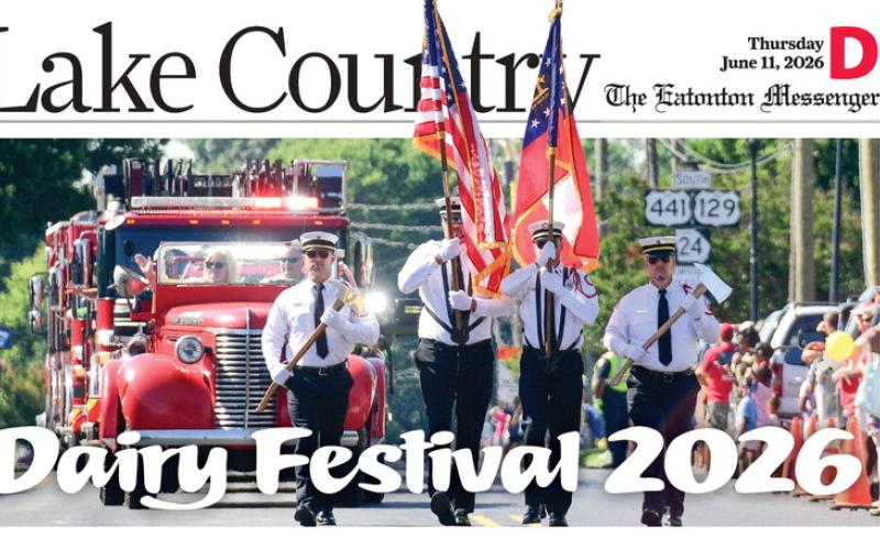 Members of the Eatonton Fire Department, including Fire Chief Jamey Williamson driving the department’s vintage fire truck were near the head of the parade through downtown streets.