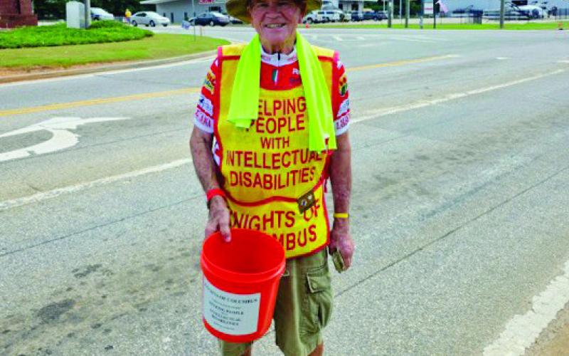 Knights of Columbus Council 13808 members recently took to the streets, collecting donations through their annual Tootsie Roll Drive.