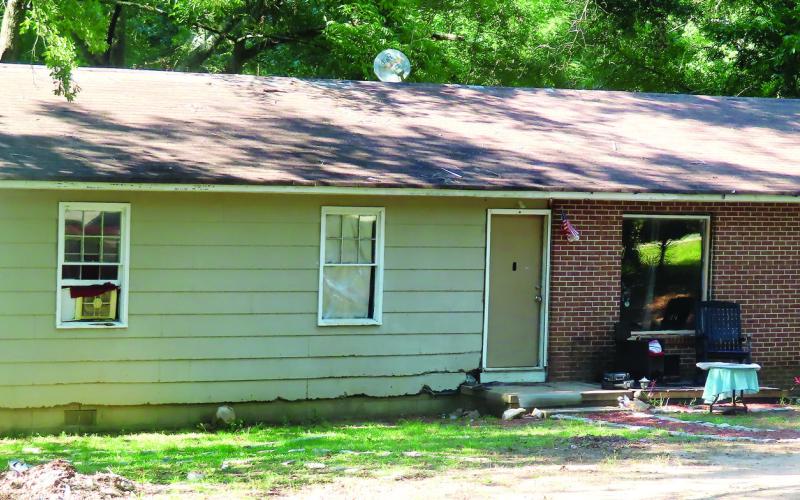 Tommy Lee Kell barricaded himself in the attic of his house and threatened a shoot-out with the officers. (CONTRIBUTED)