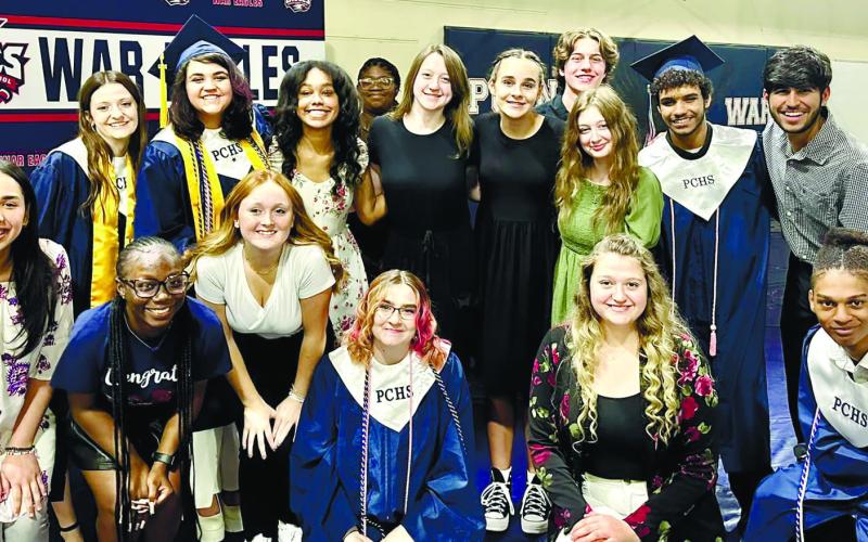 Members of the Putnam County High School chorus group take time out from rehearsing their presentation before this year’s graduation ceremonies at War Eagles Stadium last month. CONTRIBUTED