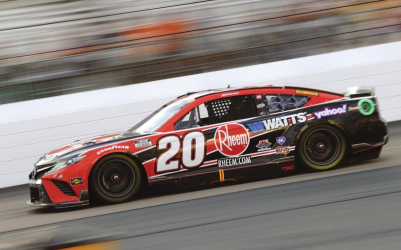 Christopher Bell, driver of the #20 Rheem/WATTS Toyota, rumbles to the win Sunday in the Cup Series Ambetter 301 at New Hampshire Motor Speedway. (Tim Nwachukwu/Getty Images)
