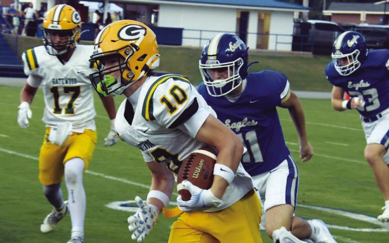 Gatewood quarterback Blake Brannen (10) rushes past Brentwood defenders in last Friday night’s loss to the War Eagles. IAN TOCHER/Staff