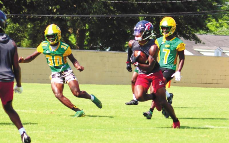 Jalon Kilgore adds yards after the catch. ARELLA CASH/Staff