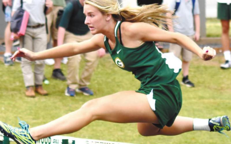 Anna Williamson would go on to finish fourth in the 100-meter hurdles and qualify for state. T. MICHAEL STONE/Staff