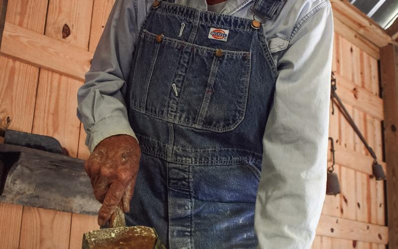 Grinding out cornmeal at the Stepback gristmill was Alan Oakley, who said he’d designed a similar mill when he was just 14 years old. IAN TOCHER/Staff