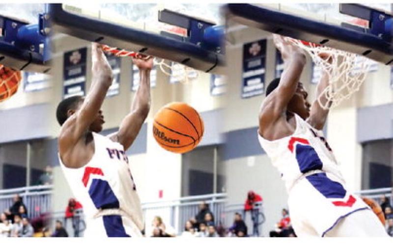 War Eagles’ senior Eren Banks (1) goes up for a dunk against Jasper County. ARELLA CASH/staff