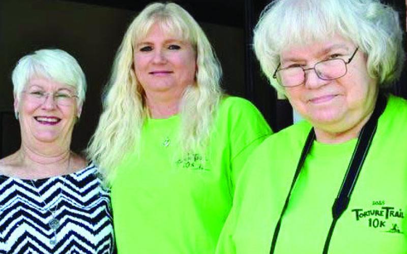 JoAnn Smith (l-r), Cassandra Fowler and Becky Meyer in front of The Messenger office. CONTRIBUTED