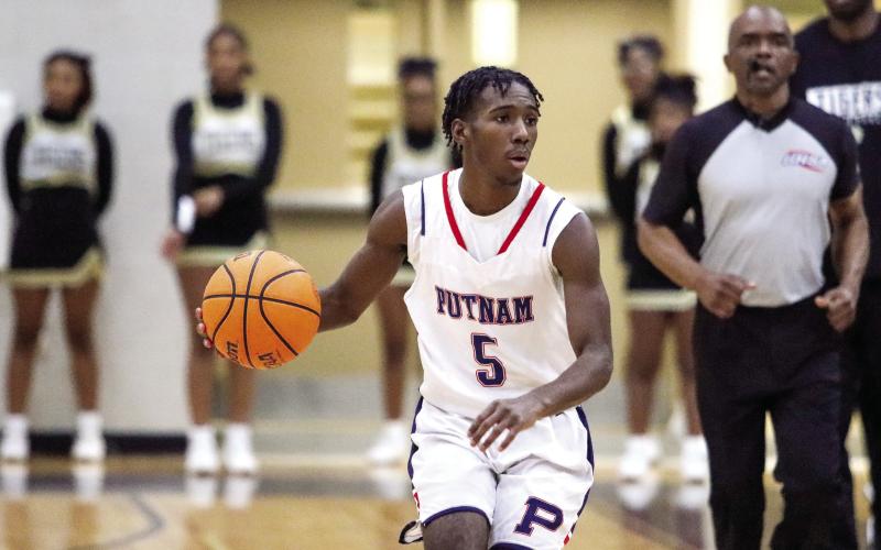 Putnam County junior Jaylin Harper (5) played a huge part in his team’s two region wins last week. LANCE MCCURLEY/Staff
