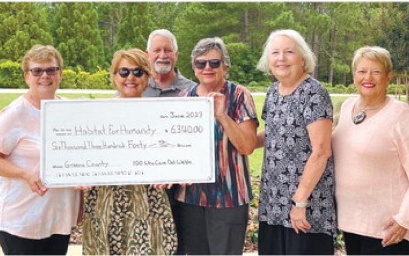 L-R: Betty Aubin, Jan Broughton, Bob Glaze, Polly Kopp, Karen Grigg and Sharon Glaze hold the check. CONTRIBUTED