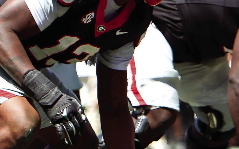 Georgia edge rusher Mykel Williams (13) lines up before a play during the annual G-Day scrimmage. (LANCE MCCURLEY/Staff)