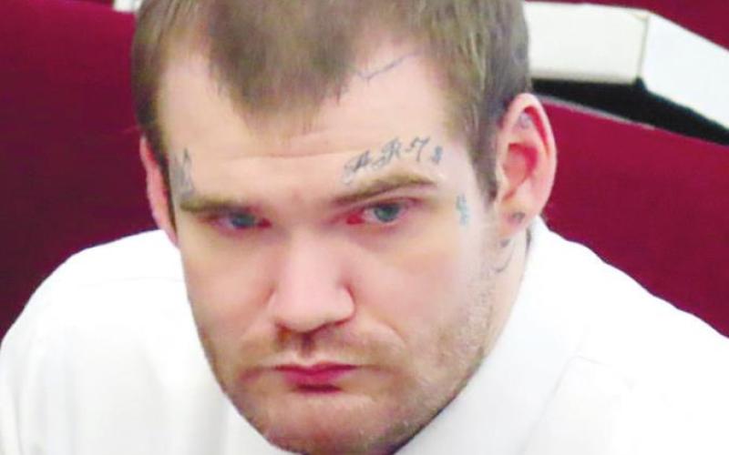 Defendant Ricky Dubose watches opening statements in Putnam County. COURT POOL COVERAGE