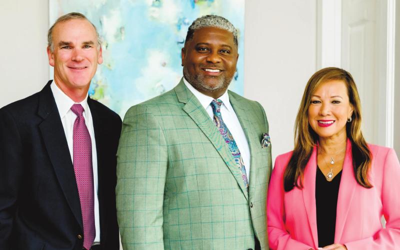 Ted and Riezl Baker of Luxury Lake Oconee Real Estate Group are pleased to welcome Jon Peeler, center, to the sales agent team as an Associate Broker. CONTRIBUTED