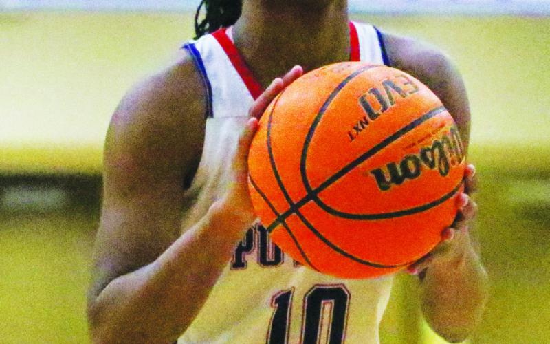 Journey Waller lines up at the free throw line during the third quarter of Putnam County’s first-round playoff game against Gordon-Lee. TREY NORRIS/Staff