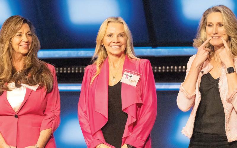 Lisa Tubbs, Cammie Wolf Rice and Jaye Watson demonstrate the benefits of a smile and the difference it makes within you and for those around you. LEIGH LOFGREN/Staff