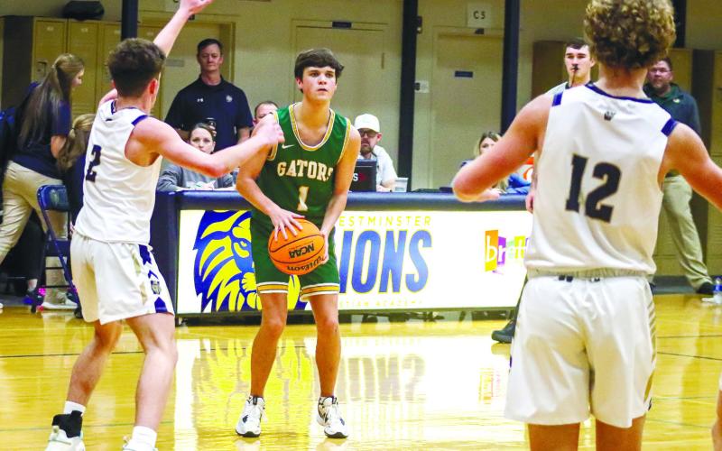 Jackson Morris (1) is a 3-point specialist and solid playmaker for the Gators.
