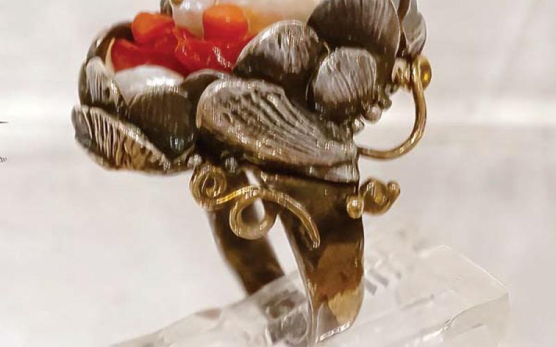 Seashells ring of sterling silver, 14k, 24k gold, pearl, and coral. LEIGH LOFGREN/Staff
