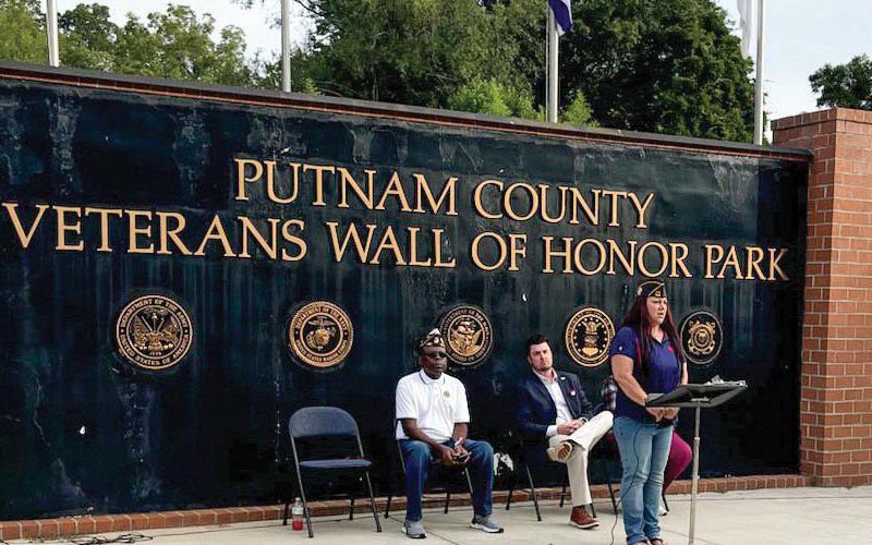 U.S. Army veteran and VFW Veterans of Foreign Wars Commander Nikki Barker introduced Putnam County Clerk of Courts Trevor Addison (center) as the guest speaker last Wednesday during a 9/11 remembrance ceremony in Eatonton. CONTRIBUTED