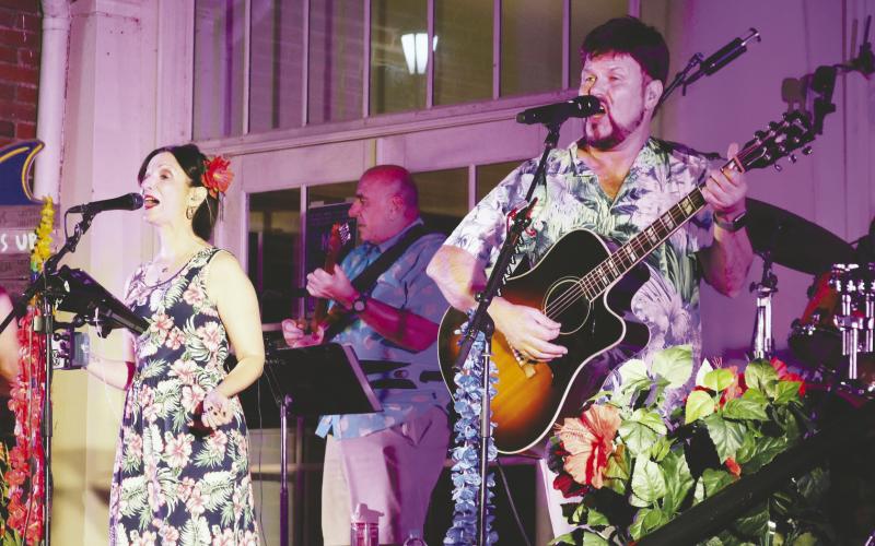 Jeff Pike, lead singer and guitarist for A1A, “The Official and Original Jimmy Buffett Tribute Show,” will bring his band’s feel-good vibes and impressive performance and stage presence to entertain crowds Sept. 23, in an outdoor concert at the Plaza Arts Center in Eatonton. CONTRIBUTED