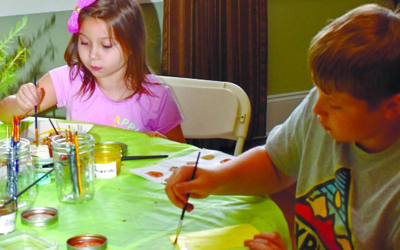 Chloe and Josh Hardie are coloring with paints made out of spices.