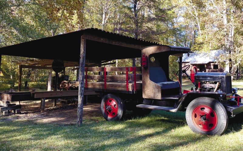 The 1928 replica farm truck beside the sawmill, which held working demonstrations. EMME CLAUSE/Staff