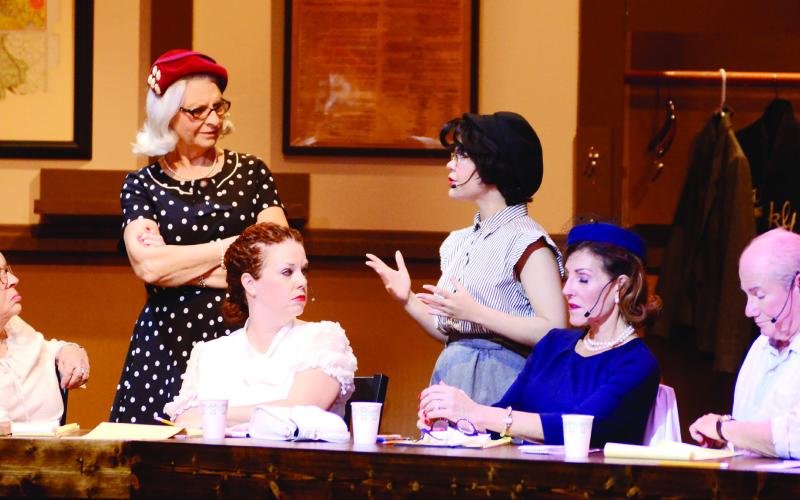 L-R: Jurors Nos. 6, 7, 5, 11, 4 and 3 listen to an argument about the fairness of judging others on the basis of preconceived notions.