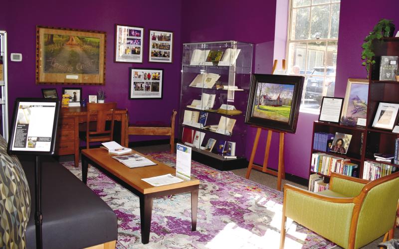 The Alice Walker mini-musuem sits to the right of the door inside the library and features a variety of signed books, books to read, history on Walker’s life, and a desk to write at. BAILEY MCCULLY/Staff