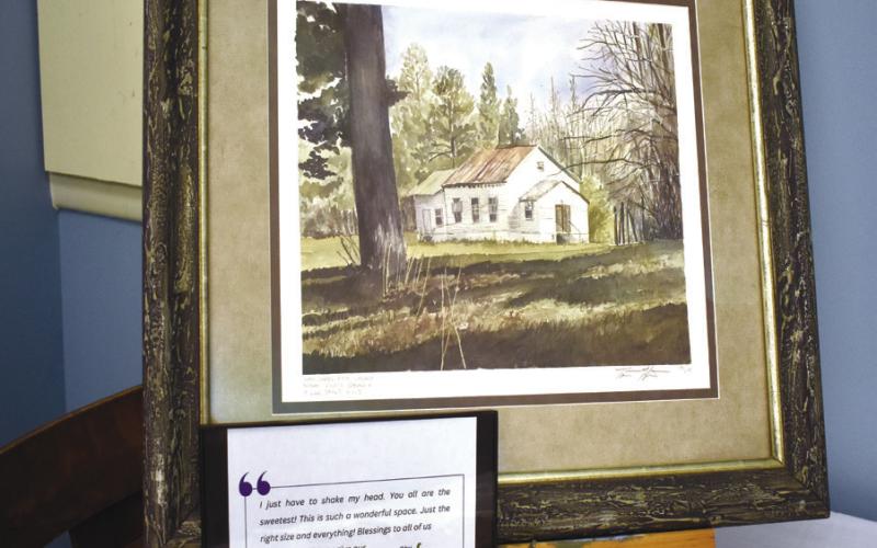 Alice Walker’s written comment about the museum was displayed beside a painting of her childhood church. BAILEY MCCULLY/Staff