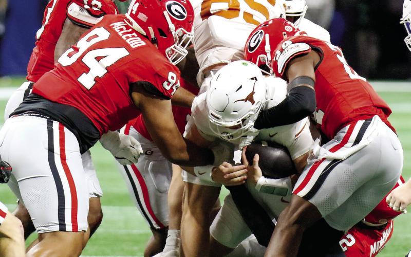 Georgia’s defense made the run game difficult for Texas, holding the Longhorns to just 31 rushing yards. LANCE McCURLEY/Staff