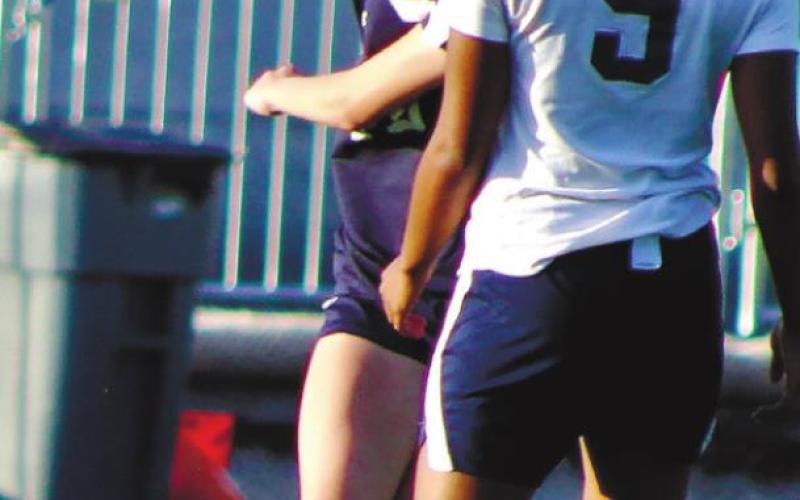 Gracie Bird watches her kick sail toward the other end of the pitch. ARELLA CASH/Staff