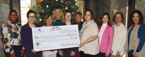 L-R: Bria Brown, St. Mary’s Manager of Support Services; Delaney Gunnett, mammogram tech; Sue Colson, 100 Women; Tanya Adcock, St. Mary’s President; Lauren Floyd, Mammogram tech; Becky Smith, St. Mary’s Good Samaritan Foundation Board Chairman; Elaine Craft, radiology; Rebecca Prance, 100 Women board member; Nancy Marshall, 100 Women; and Jackie Greer, 100 Women. IAN TOCHER/Staff