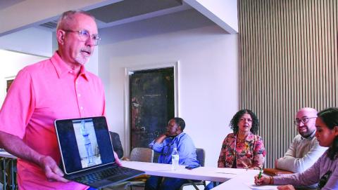 Kevin Tomson Hooper of The Artisans Village displayed to the EPTAH group a laptop image of the statue being created by worldrenowned sculptor Basil Watson of Eatonton native and Tuskegee Airman Col. Hiram Little Sr. IAN TOCHER/Staff