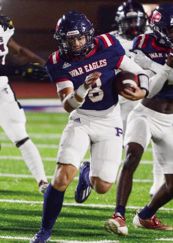 Quarterback Brannan Griffin (8) scored twice for the War Eagles and performed well all night in leading the War Eagles to a big 48-14 win over Towers. IAN TOCHER/Staff