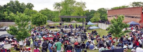 A sizable crowd grew steadily as the day wore on Saturday for the “Peg Leg” Howell BBQ &amp; Blues Festival at City Center Stage in downtown Eatonton. GORDON COLUMBINE/Staff