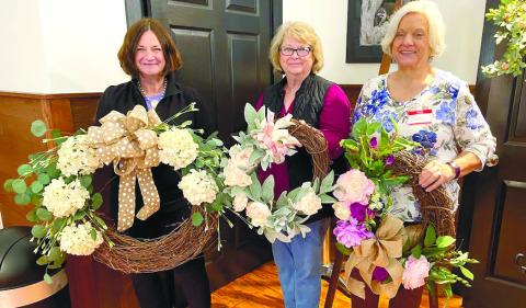 Rebecca McRobbie, Teresa Schultz and Linda Base Moore enjoy the Spring Wreath Class.