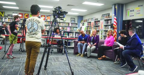 PCMS broadcasting teacher Bill Rakosnik showcased a running segment, “Q &amp; A with Faculty,” on the in-school broadcast show produced by his class. The demonstration showed student anchors and camera crew at work and the segment was recorded live in front of the board. BAILEY MCCULLY/Staff