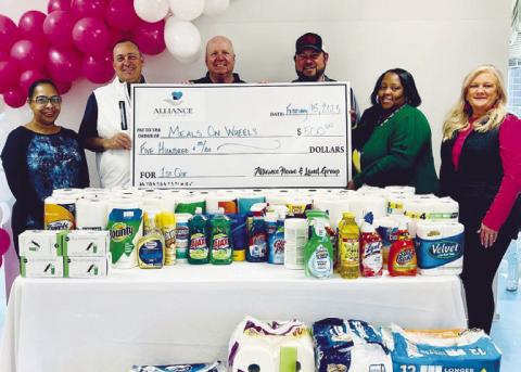 Alliance Home & Sales donates $500 to Meals on Wheels. CONTRIBUTED