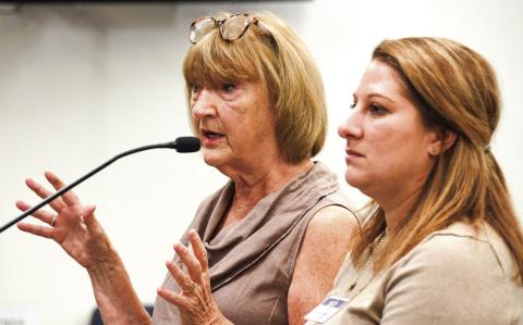 Lyn Romine (left) and Georgia Writers Museum Director Melissa Swindell made an impassioned pitch before the Eatonton Council to inaugurate its recently purchased, former Putnam County Elementary School as the host building for a special, touring Smithsonian exhibit next April. IAN TOCHER/Staff