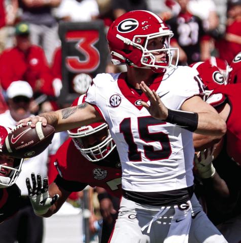 Carson Beck (15) during Georgia Football’s G-Day game at Sanford Stadium April 13. Madison Keel/UGAAA