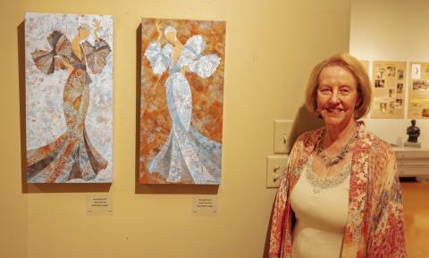 The daughter of Steffen Thomas and Sara Douglass Thomas, Lisa Conner with some of the artwork in the museum. LEIGH LOFGREN/Staff
