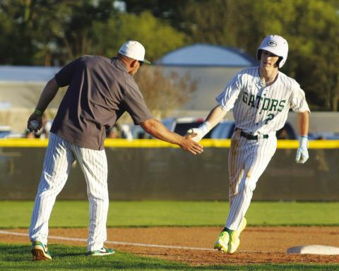 Gatewood senior Ben Brannen rounds the bases after hitting his first home run of the season on March 13 against Trinity Christian. TREY NORRIS/Staff