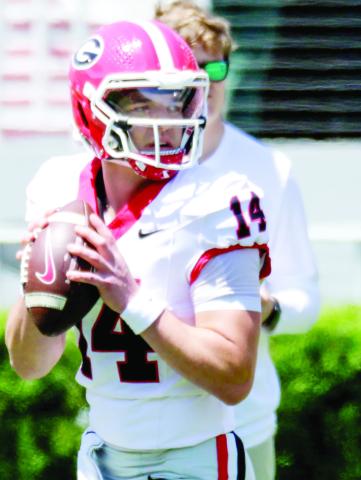 Gunner Stockton looks downfield to pass during G-Day. BRAD HARRISON/Staff