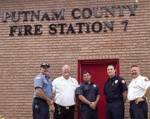Putnam County Fire Chief Thomas McClain (second from left) welcomes firefighters to Station 7 in the Long Shoals area of the county. CONTRIBUTED