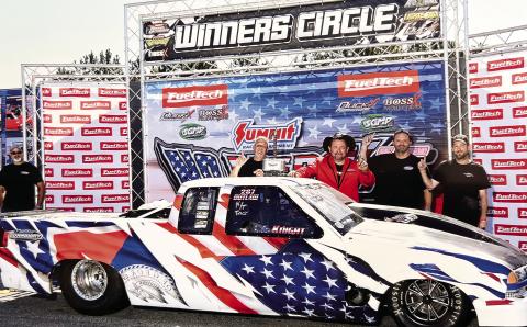 Eatonton-based racer C.G. Knight (center with hat) celebrates his No Mercy 15 win at South Georgia Motorsports Park with crewmembers Doug Colbert (left), Jason Mote, and Richard Disher. CHRIS SIMMONS/Contributed