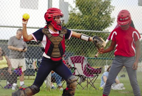 Lily Frisch gets some time behind the plate against the Lainey team.